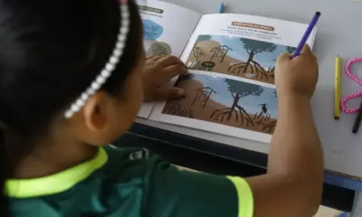 Criança relata a Lula que um "mundo mágico" se revelou ao aprender a ler