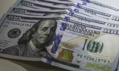 Dólar volta a R$ 5 com ambiente externo e ajuste pós-eleitoral